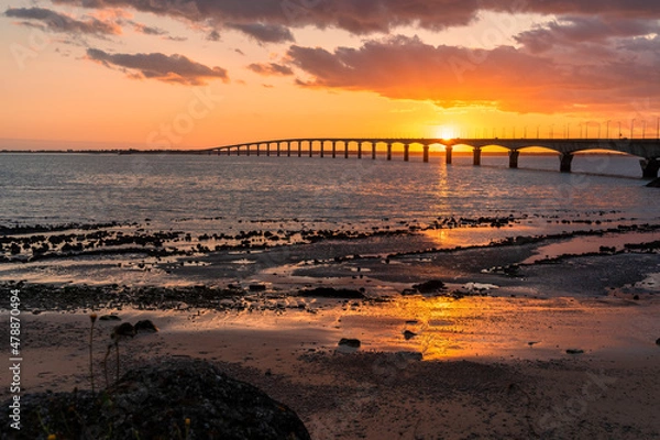 Obraz Re island bridge at sunset on a sunny evening. beautiful colors. view from La Rochelle, France