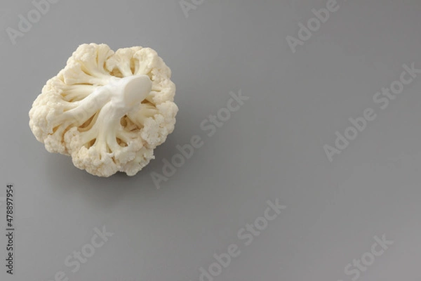 Obraz Cauliflower isolated on gray background. Copy space. Cooking recepies. White and green. Vegetarian. Organic.