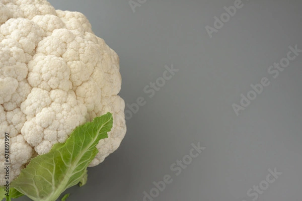 Obraz Cauliflower isolated on gray background. Copy space. Cooking recepies. Vegetarian food. Organic