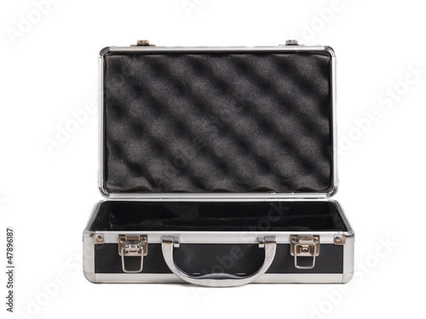 Fototapeta Briefcase opened lying on white.
