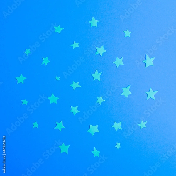 Fototapeta stars arranged in a circle on a blue background.