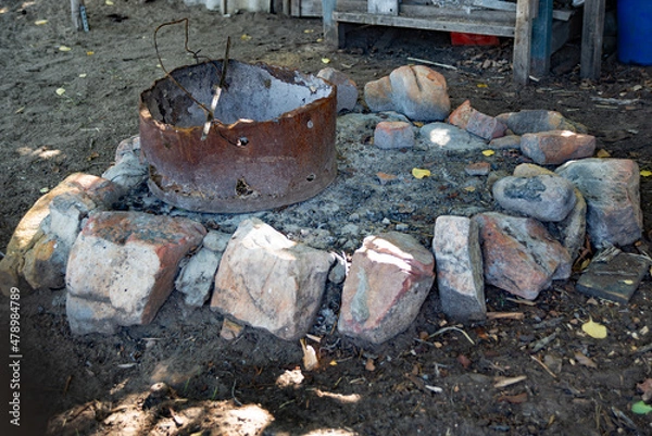 Obraz Rudimentary firepit surrounded by rocks