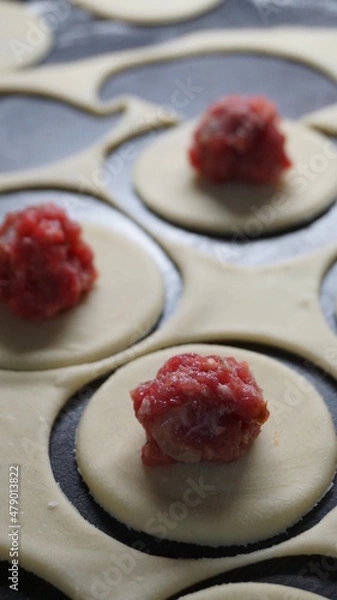 Obraz the process of cooking, modeling, recipe, dumplings, Traditional dish of Russian cuisine, round dough stuffed with minced meat, minced meat