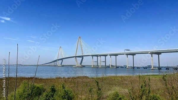 Fototapeta Arthur ravenel jr. bridge over water Cooper River in South Carolina, US, connecting downtown Charleston to Mount Pleasant.