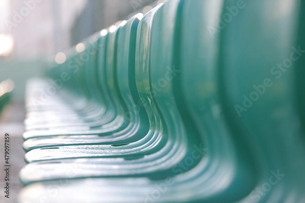 Obraz Plastic seats in the stands of the stadium Free seats in the stadium.