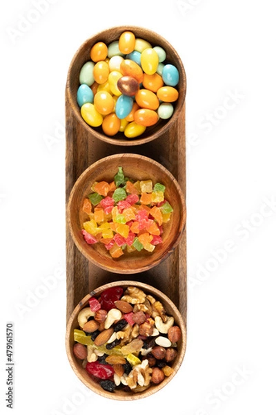 Fototapeta Natural healthy candies from nuts and fruits for proper nutrition close-up top view