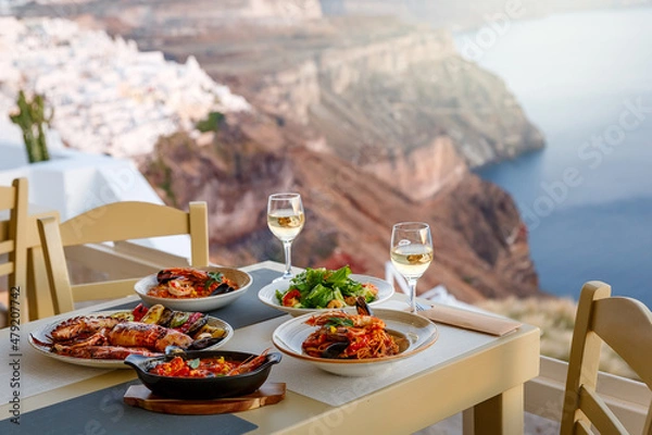 Fototapeta Dinner for two in a restaurant overlooking the sea
