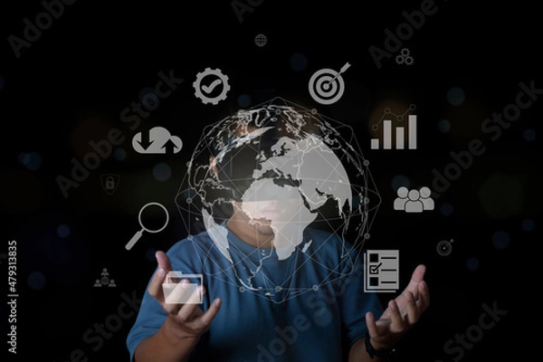 Obraz Man wearing VR glasses accessing Cloud Computing and Working with Digital Data.Virtual Global Internet connection metaverse. internet of things.Digital link tech, big data through internet technology.