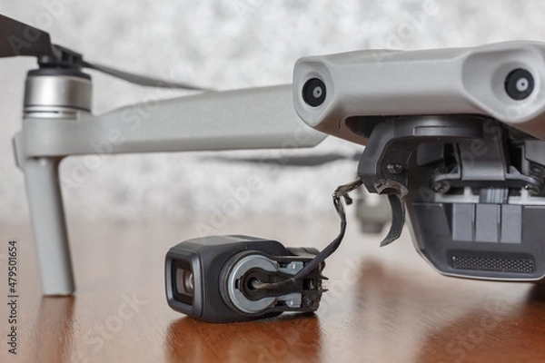 Obraz Broken camera drone after crash. Damaged camera gimbal.
