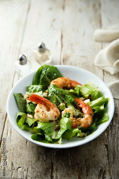 Fototapeta Homemade Caesar salad with shrimps