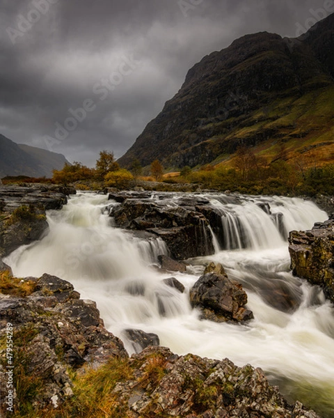 Fototapeta The power of a Scottish waterfall in a rain storm