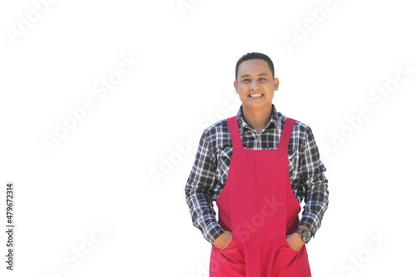 Fototapeta Handsome asian man shopkeeper wearing an apron smiling  isolated on white background, space for design