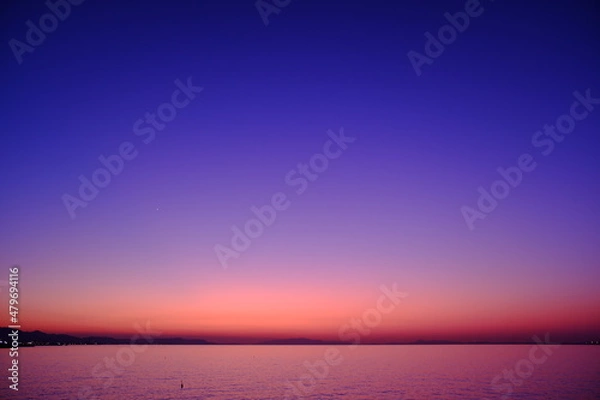 Obraz マジックアワーの夕陽と海岸