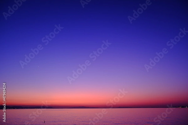 Obraz マジックアワーの夕陽と海岸