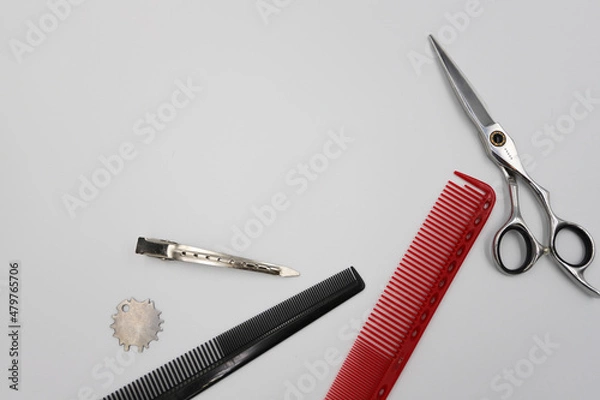 Fototapeta set of professional stylist tools on a light background