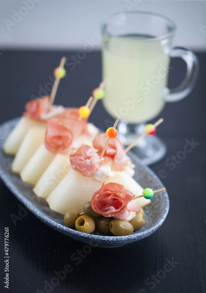 Fototapeta spanish jamon with melon snack