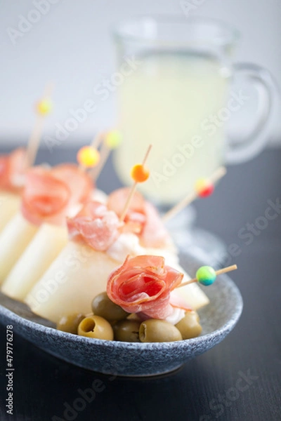 Fototapeta spanish jamon with melon snack