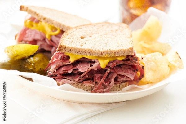 Obraz Smoked Meat - Pastrami, Corned Beef - Sandwich with Pickle