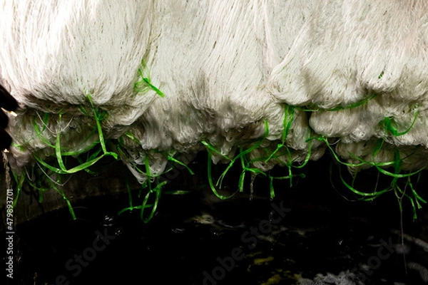 Fototapeta Silk threads in the dyeing workshop