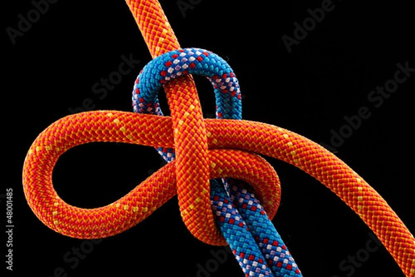Fototapeta rope knot isolated on black background
