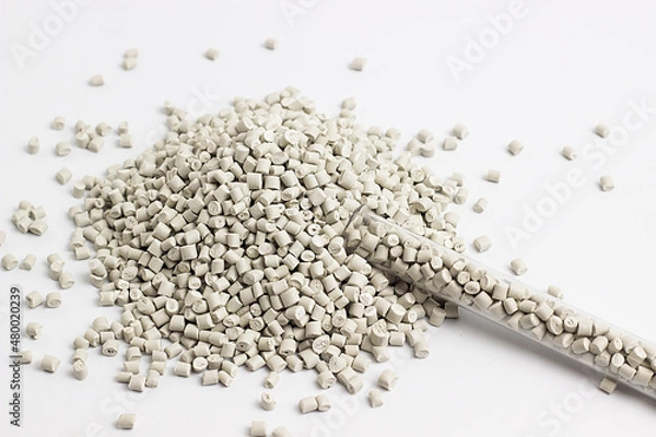 Fototapeta white granules of polypropylene, polyamide. Background. Plastic and polymer industry. Microplastic products.