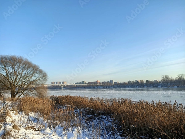 Obraz winter cityscape with river
