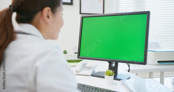 Obraz female doctor use computer