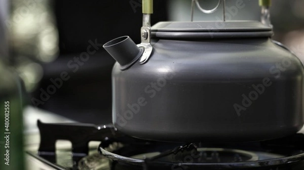 Obraz Camp tea kettle for brewing coffee or tea.