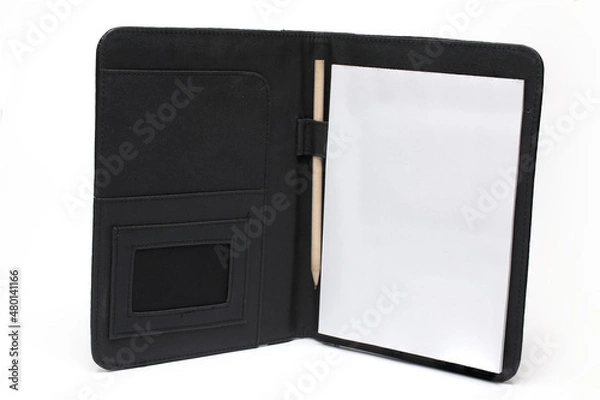 Fototapeta Closeup opened leather notepad notebook white background