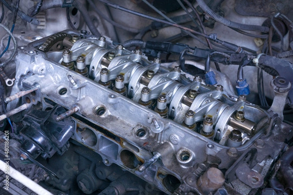 Fototapeta Engines that are heavily used until they are broken, have to open the cylinder head to check for the cause of failure.