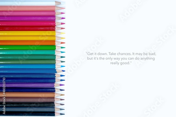 Fototapeta Get it down. Take chances. It may be bad, but it's the only way you can do anything really good. Motivational quote on white background with color pencil  