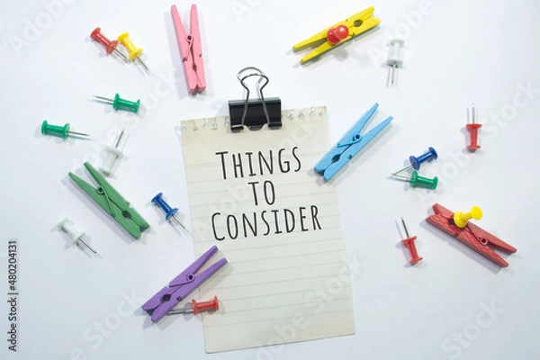 Fototapeta Text sign showing Things to Consider with copy space, stationery items in white background 