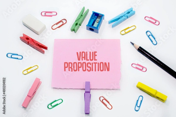 Obraz Value Proposition written on Set of colorful paper clips with white copy space background