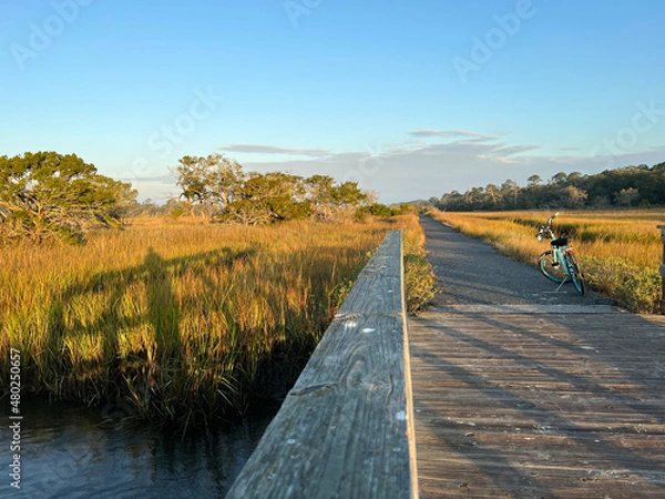 Obraz Sunrise at the saltmarsh at Clam Creek on Jekyll Island, Georgia, a popular slow travel destination in the southern United States.