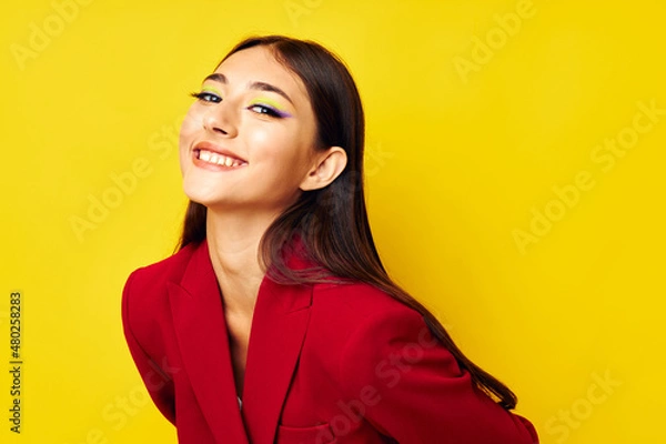 Fototapeta portrait pretty woman attractive look cosmetics red jacket studio model unaltered