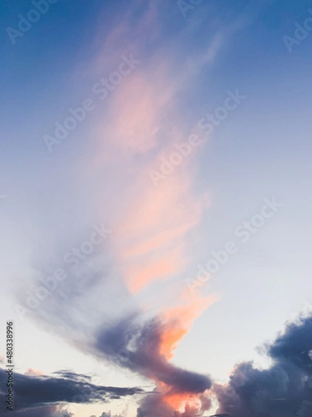 Fototapeta Fantastic colorful clouds in the blue sky, surrealistic nature background 