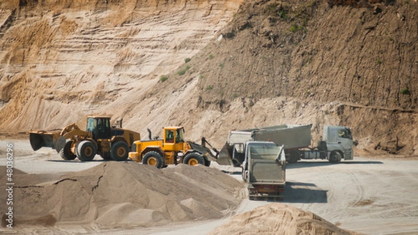 Fototapeta Machines working at gravel pit
