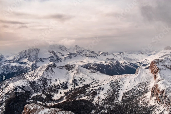 Fototapeta Stormy clouds in italian dolomites in a snowy winter
