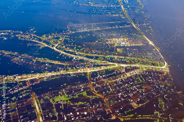 Fototapeta Aerial view of the flooded village in floodland of the Ob river in Siberia