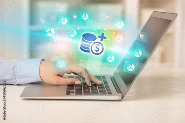 Fototapeta Businessman working on laptop with new business