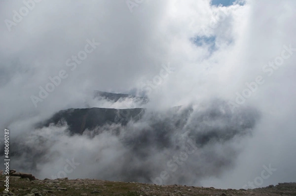 Fototapeta clouds over the mountain