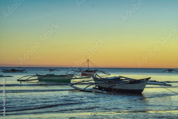 Obraz Dawn at Bulalacao fishing village, Oriental Mindoro. sunrise soon. The village comes to life and the net fishing begins again.  Traditional fishing and the main income for the village