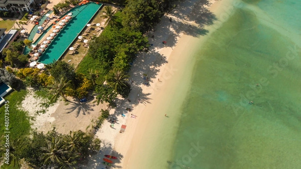 Fototapeta Phi Phi Don, Thailand. Overhead aerial view of Phi Phi Island coastline and beach from drone on a hot sunny day.