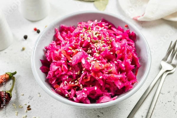 Fototapeta Asian spicy beetroot cabbage salad. Top view, copy space.