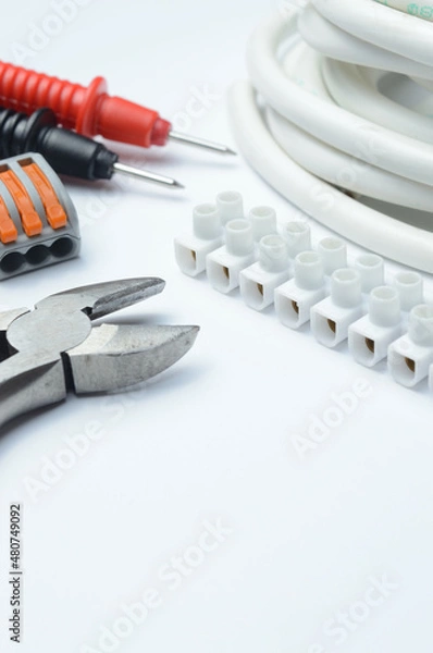 Fototapeta tools for electro repair on a light background. close-up.