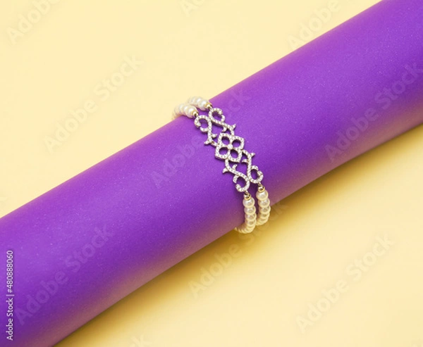Obraz Bracelet isolated on the yellow background