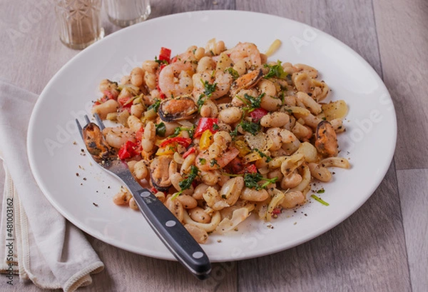 Obraz Chilli seafood salad with white beans.