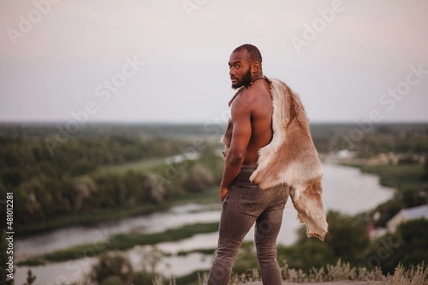 Obraz portrait of african american man in furs