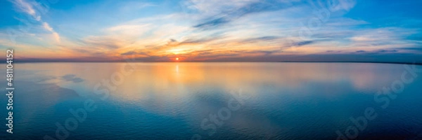 Obraz Wide aerial panorama of seascape - sunset reflecting in calm sea