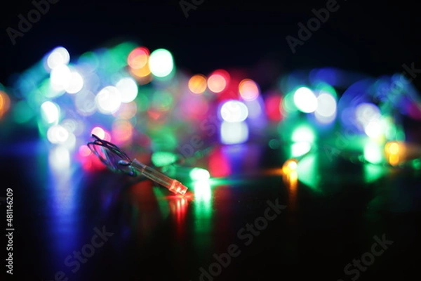 Obraz colored bokeh on a black background